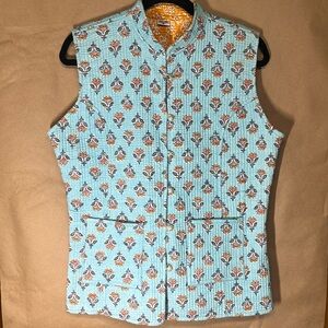 Quilted reversible mock neck vest